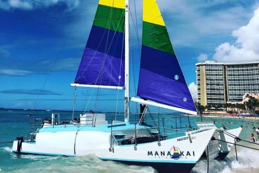 Board from Waikiki Beach: Scenic Sunset Sail on the Hāwea - The Onboard Vibe: Bar Drinks, Music, and Crew Energy