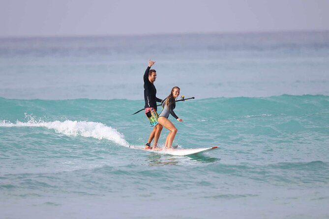 Group Surf Lesson with Videos and Photos - Catching a Wave: What the Guarantee Means for Beginners