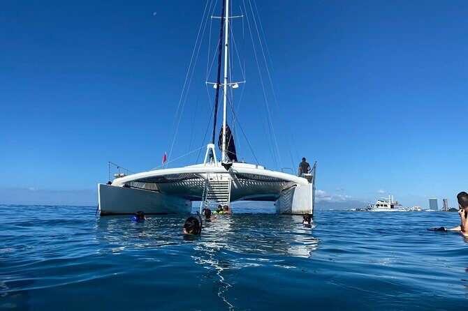 Moana’s Swim’n’Sail Cocktail Cruise Along the Waikiki Coast - Moana Sailing Co.: a 2-hour “cocktail hour” with real ocean time