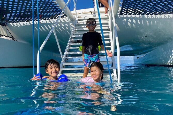 Moana’s Waikīkī Grand Guided Turtle Snorkel & Sailing Adventure - Turtle Canyon snorkeling setup: gear, raft, and lifeguard watch