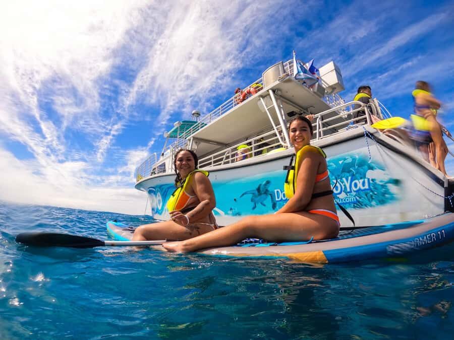Oahu: Dolphin Watching & Turtle Snorkeling with Waterslide - Spotting spinner dolphins in their habitat (and why timing matters)