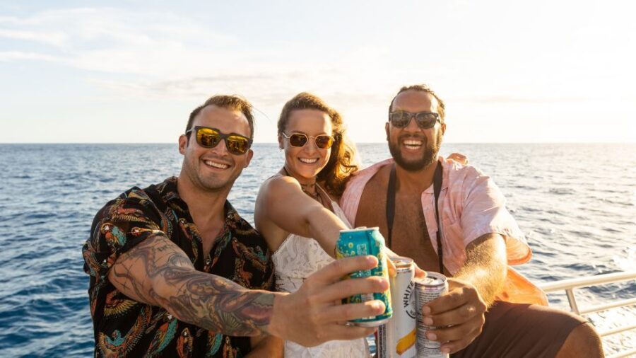Oahu: Premium Waikiki Sunset Party Cruise with Live DJ - The Party Switch: DJ, Surround Sound, and Purple-Glow Deck Energy