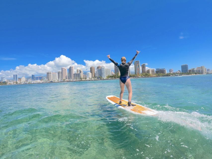 Oahu: Surfing Lessons for 2 People - What you receive: Hurley rash guard, reef shoes, board, leash, and optional wetsuit