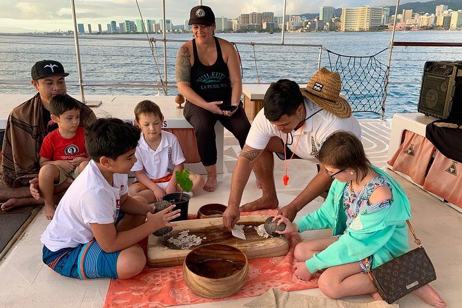 Polynesian Canoe Sunset Sail - The cultural program: ukulele, chants, lei making, and hula moments