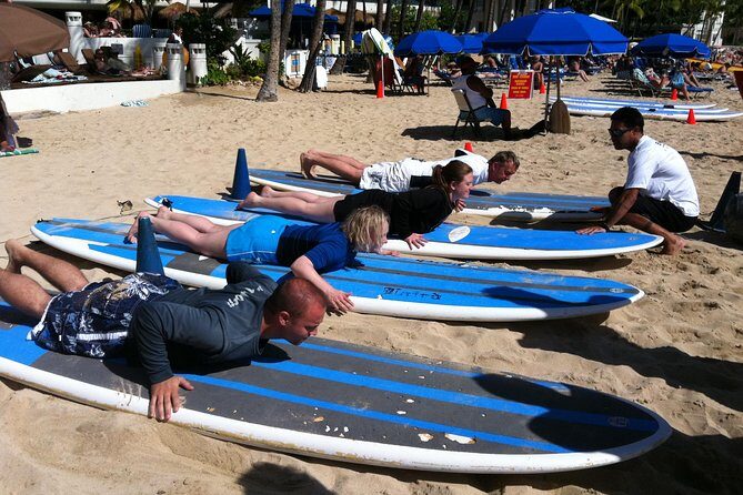 Private Group Surf Lesson for 4 by Waikiki Beachboys at the Royal - In-water coaching: paddling, standing, and balance for real beginners