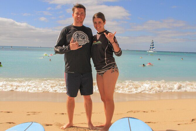Semi-Private Surf Lesson for 2 or 3 people on Waikiki Beach - In the water: paddling, wave-catching, and safety guidance
