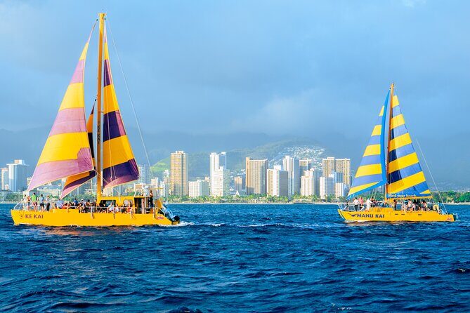 Waikiki Beach Sunset Sail - Onboard vibe: drinks, music, and crew energy