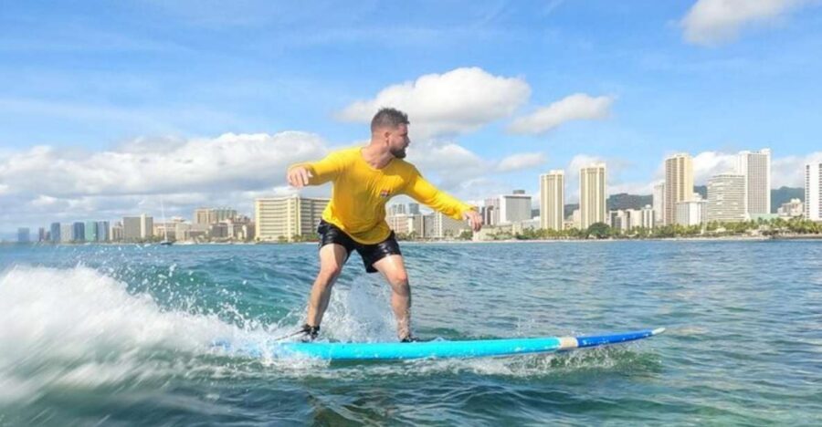 Waikiki Beach: Surf Lessons - What You Get in the Bag: Rash Guard, Reef Shoes, and a Beginner-Friendly Board