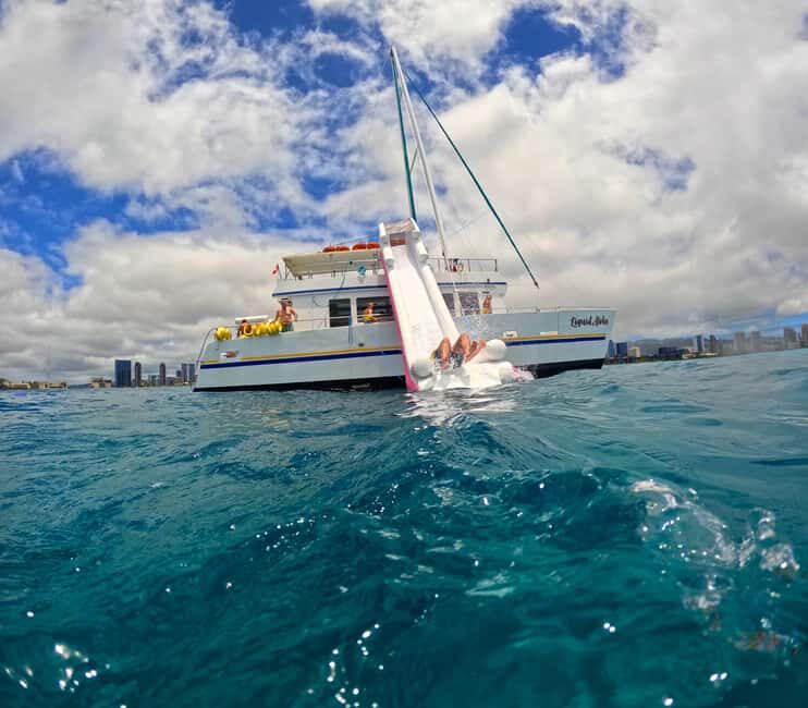 Waikiki: Snorkeling & Ocean Playground Experience - Inside the 55-Foot Double-Deck Catamaran: Shade, Space, and Easy Water Entry
